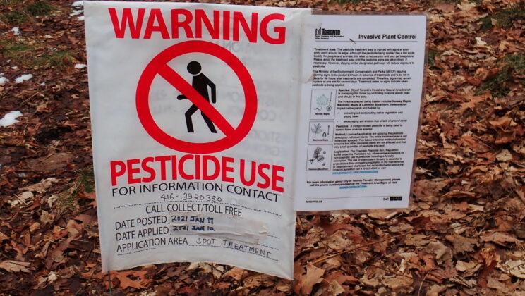 Pesticide use sign