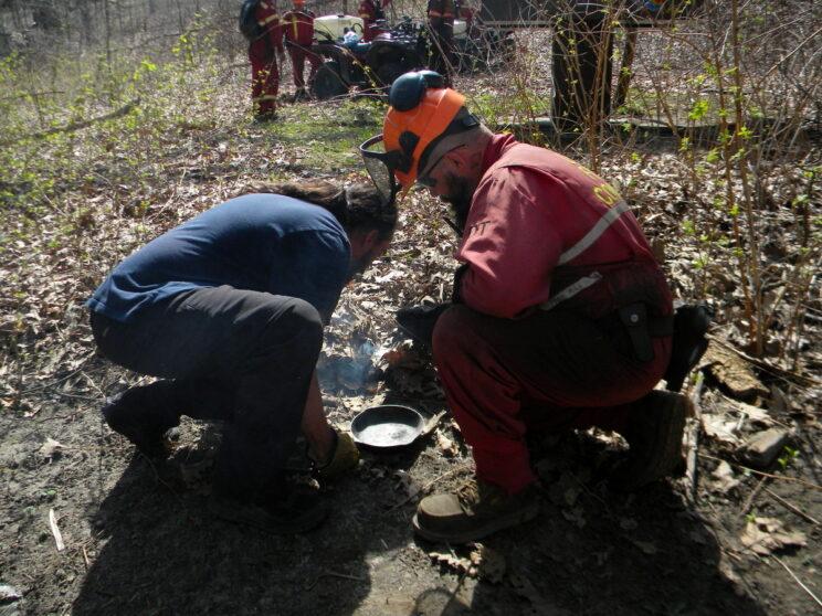 Igniting with coals from sacred fire. 2026. Photo: Irene Wilk