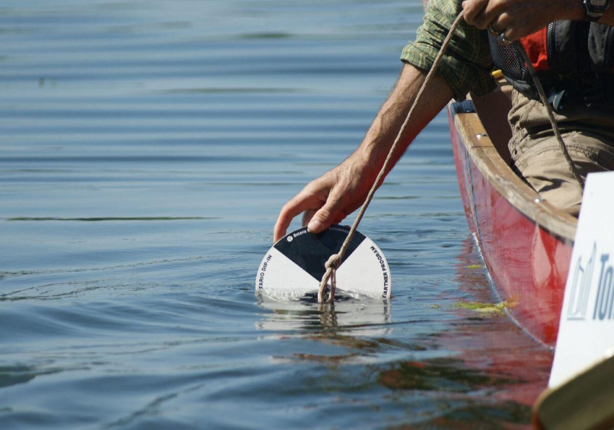 Using the Secchi Disk. Photo: Katherine Pawling